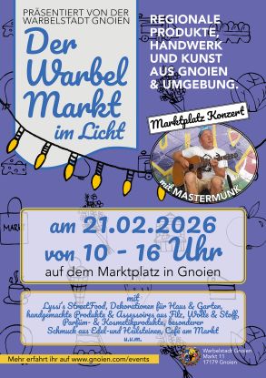The Warbel market in the light with a marketplace concert by MASTERMUNK, &copy; Warbelstadt Gnoien